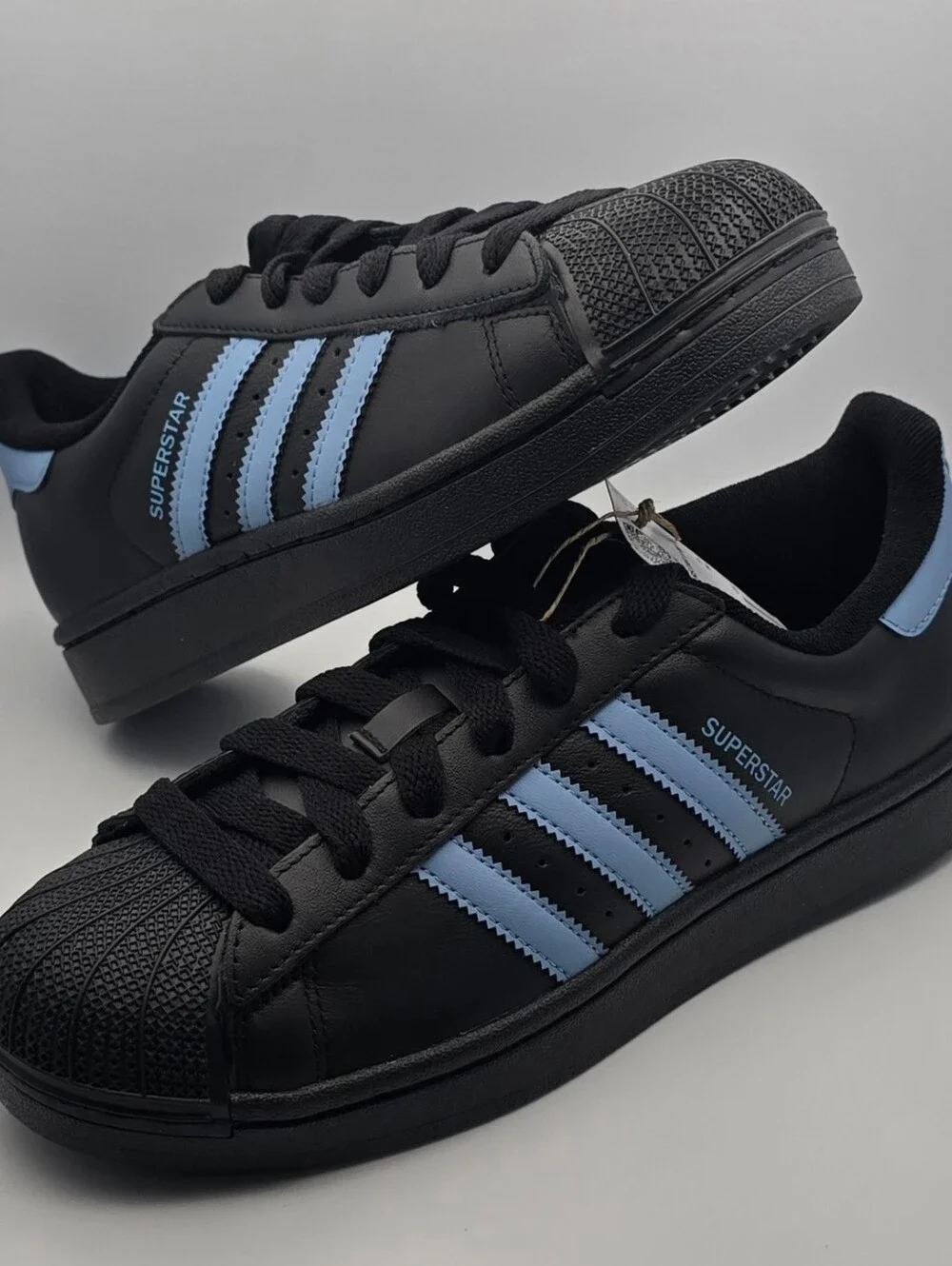 Adidas Superstar Black Sneaker with Light Blue Stripes